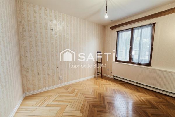 Plain pied à fort potentiel dans quartier prisé.