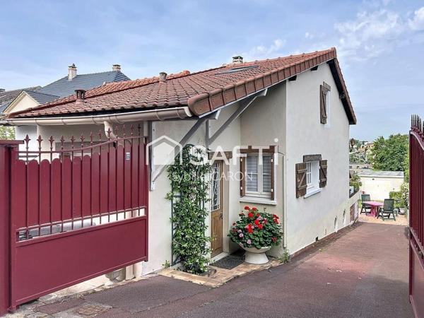 Maison avec jardin, terrasse et grand garage