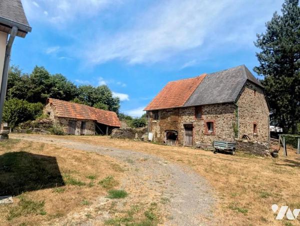 Maison avec dépendances et terrain arboré