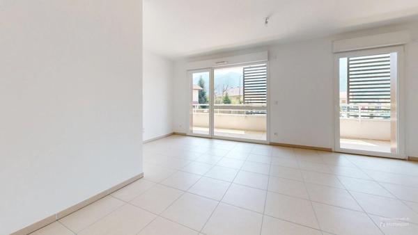 Appartement T4 de 82 m² en rez de jardin à VOREPPE (38)