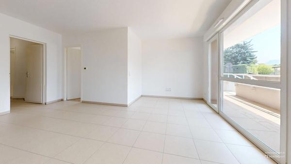 Appartement T4 de 82 m² en rez de jardin à VOREPPE (38)