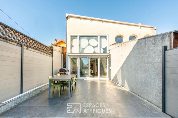 Maison type loft avec jardin