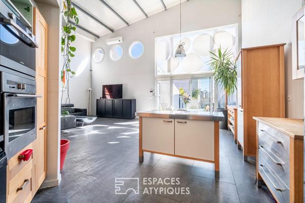 Maison type loft avec jardin
