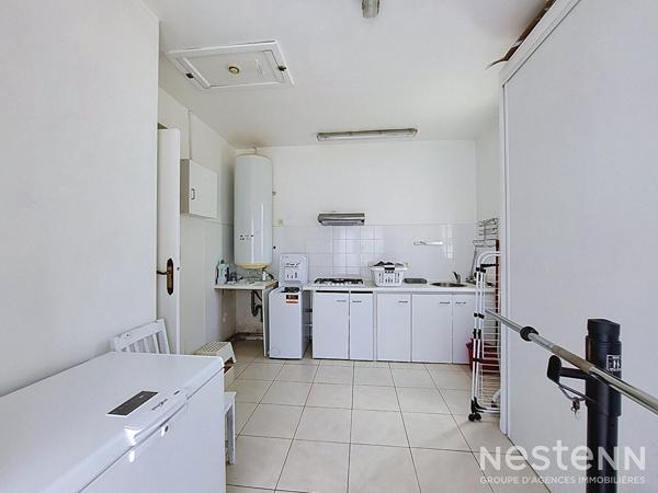A Vendre Maison de plain-pied de 136 m² avec double garage sur terrain arboré d'environ 4 800 m²