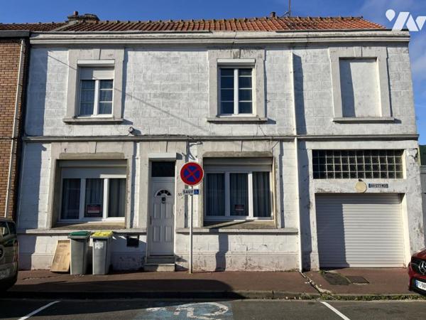 GRANDE MAISON avec garage et jardin, à rénover