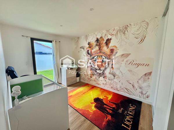 PLAIN PIED 4 CHAMBRES DONT UNE SUITE PARENTALE, GARAGE ET JARDIN A VOUILLE