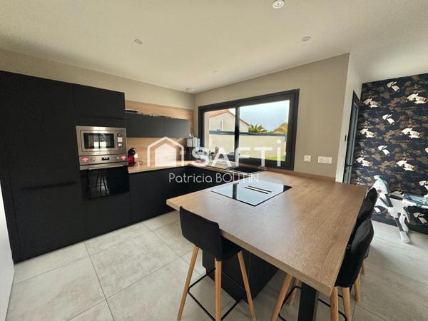 PLAIN PIED 4 CHAMBRES DONT UNE SUITE PARENTALE, GARAGE ET JARDIN A VOUILLE