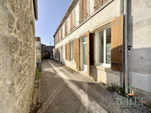 APPARTEMENT PLAIN-PIED EN CENTRE VILLE