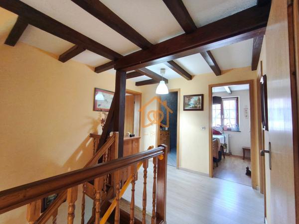 En exclusivité Jolie Maison de 150m² au sol à HOLTZHEIM avec piscine chauffée, climatisation sur 7 ares de terrain