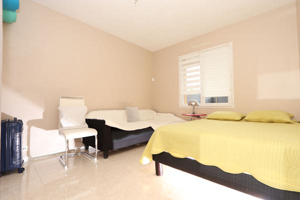 Maison familiale d'environ 170 m², 5 chambres, vie de plain-pied, garage, agréable jardin