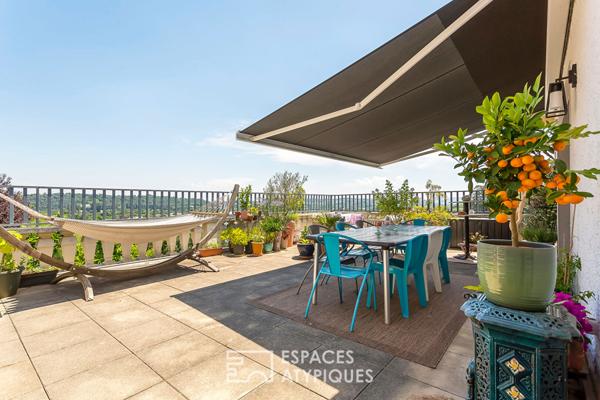 Appartement type maison avec terrasses et jardin