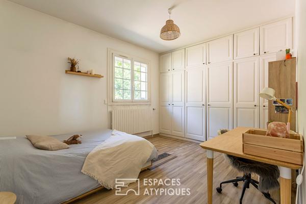 Appartement type maison avec terrasses et jardin