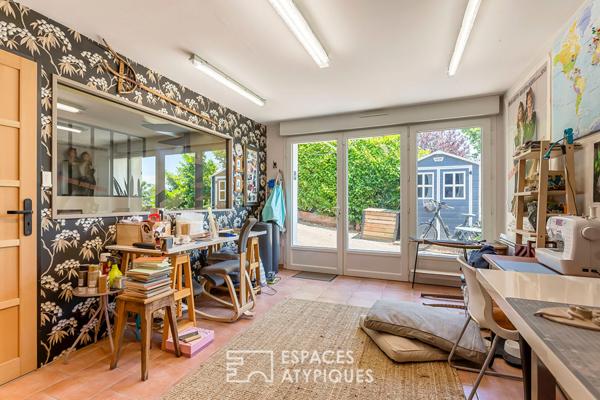 Appartement type maison avec terrasses et jardin