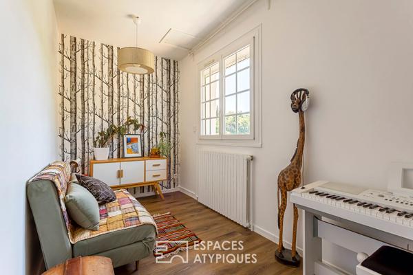 Appartement type maison avec terrasses et jardin