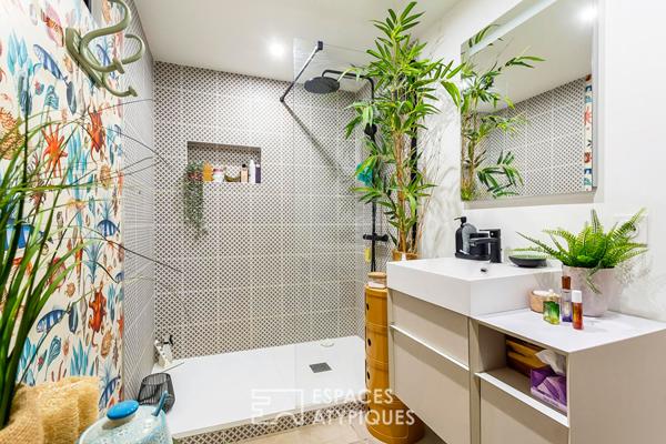 Appartement type maison avec terrasses et jardin