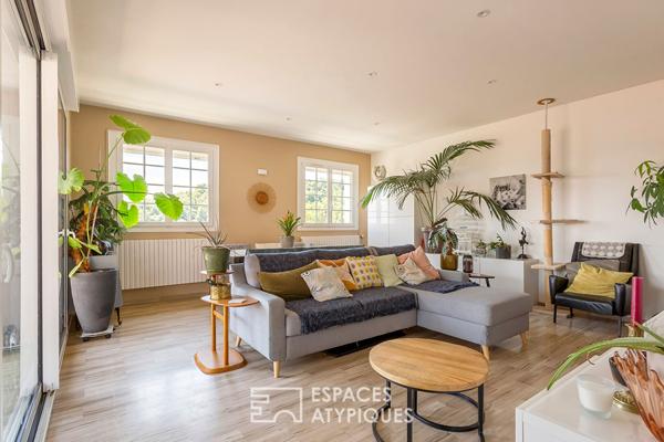 Appartement type maison avec terrasses et jardin