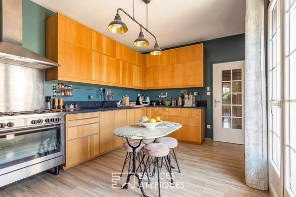 Appartement type maison avec terrasses et jardin