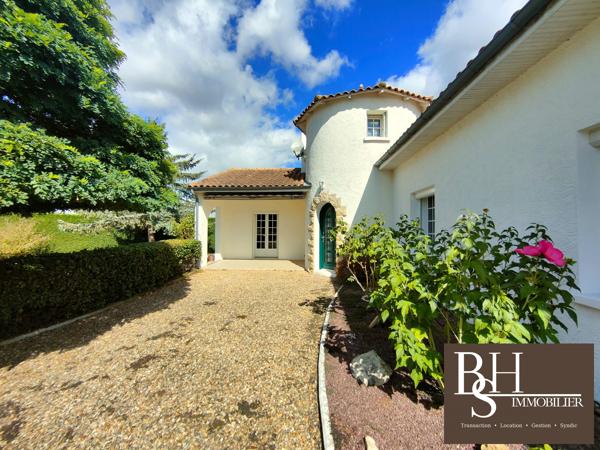 Maison 5 pièces de 187m² sur parcelle de 2065m² avec piscine, garages et boulodrome