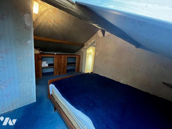 Maison de style normand, couverte en ardoises