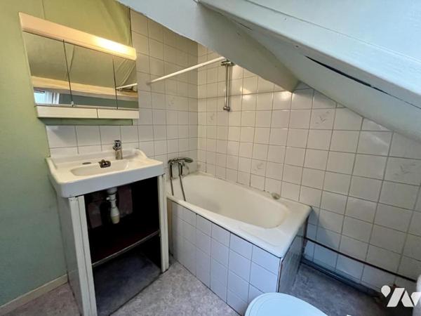 Maison de style normand, couverte en ardoises