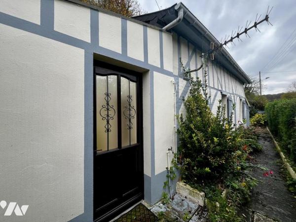 Maison de style normand, couverte en ardoises