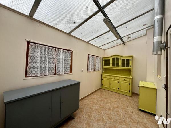 Maison de style normand, couverte en ardoises