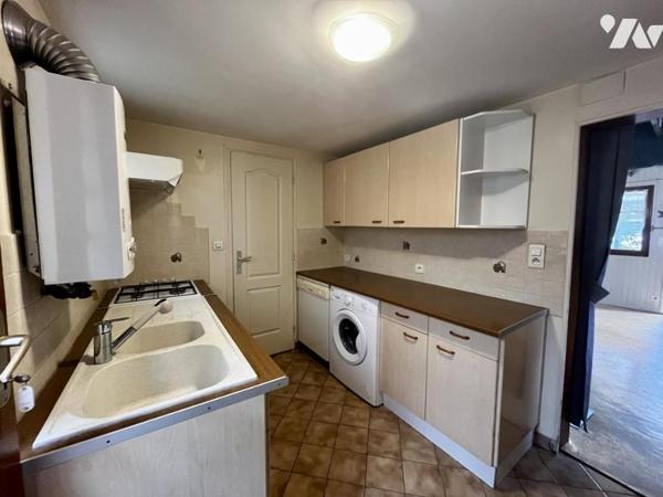 Maison de style normand, couverte en ardoises