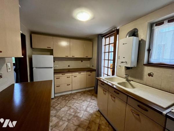 Maison de style normand, couverte en ardoises