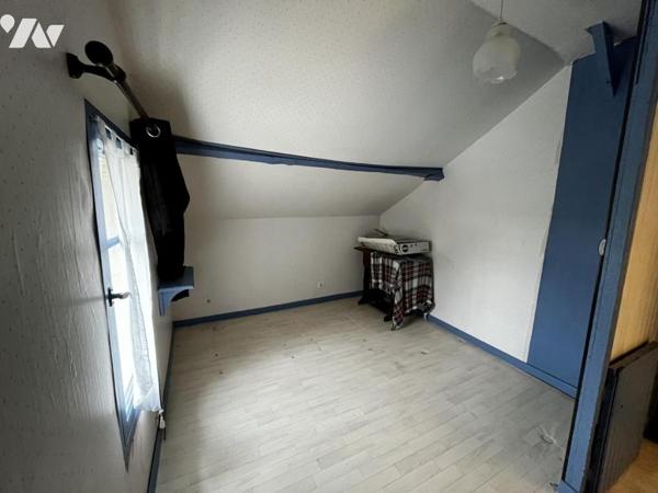 Maison de style normand, couverte en ardoises