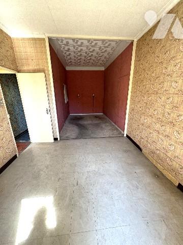 Appartement T3/T4 + terrasse et balconnet au 1er étage + cave et box-garage