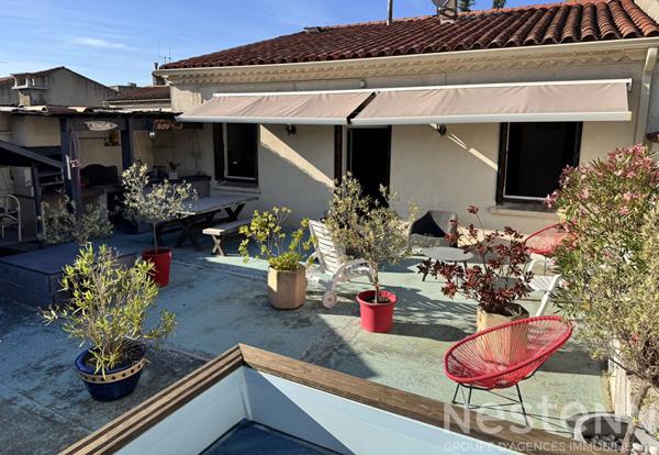 Vente immeuble Carcassonne comprenant local commercial loué 1751 euros et logement 115 m² avec terrasse