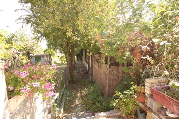 A LIEVIN (62), maison 4 pièces, 2 chambres, 120m², garage , jardin