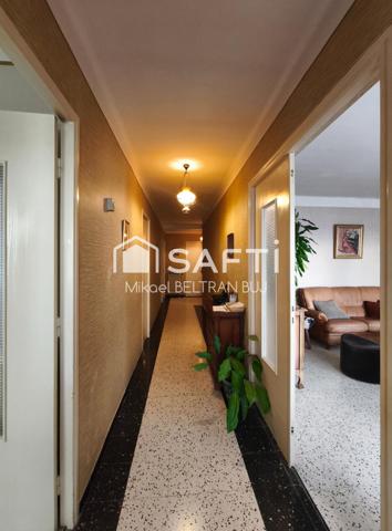 Maison familiale avec immense rez-de-chaussé exploitable