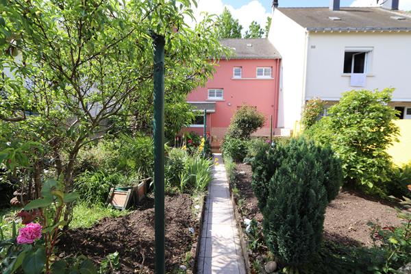 Maison en centre-ville, 3 chambres, jardin clos et garage - 75 m² habitables