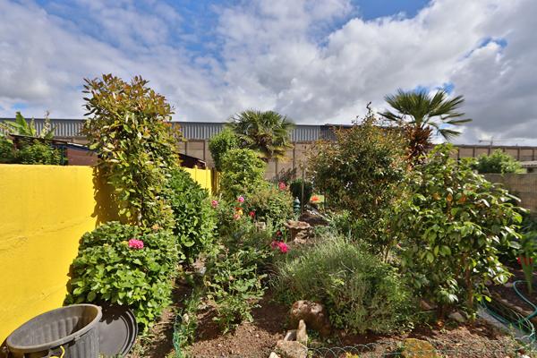 Maison en centre-ville, 3 chambres, jardin clos et garage - 75 m² habitables