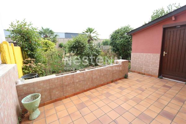 Maison en centre-ville, 3 chambres, jardin clos et garage - 75 m² habitables