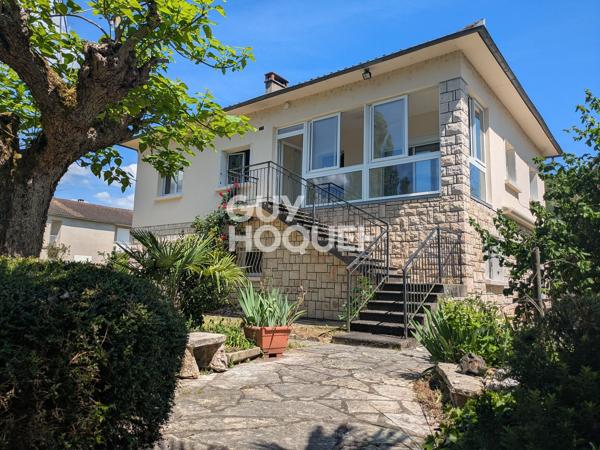 Maison avec jardin à deux pas du centre-ville