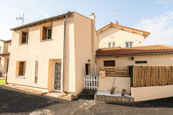 Maison 2 chambres avec garage et extérieur