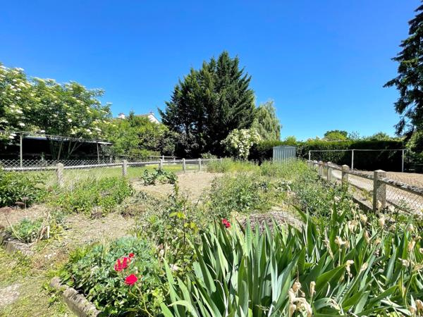 Maison mitoyenne avec terrasse et jardin