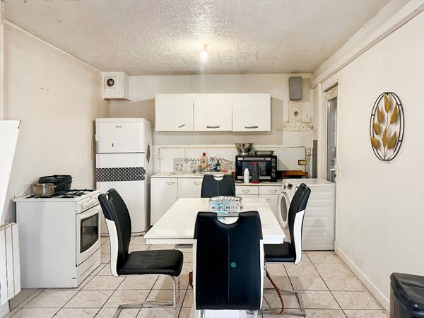 A VENDRE - Ensemble immobilier de deux maisons en location