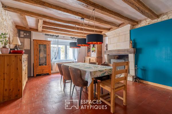 Authentique maison de bourg en pierre avec garage et cave voûtée