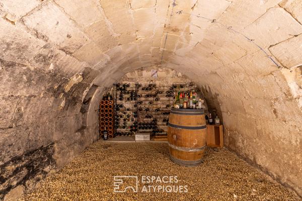 Authentique maison de bourg en pierre avec garage et cave voûtée