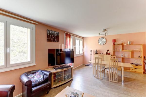 Appartement t5 avec 3 chambres, cave et stationnement