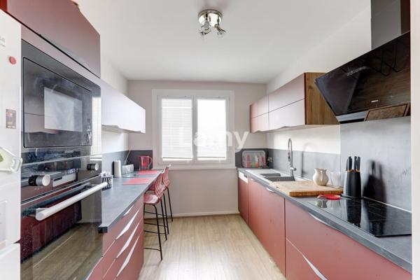 Appartement t5 avec 3 chambres, cave et stationnement