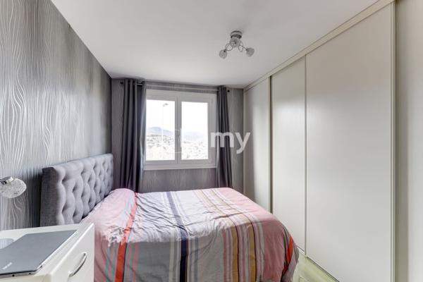 Appartement t5 avec 3 chambres, cave et stationnement
