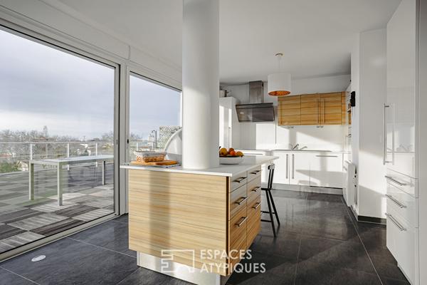 Penthouse lumineux à la vue panoramique et son garage XXL