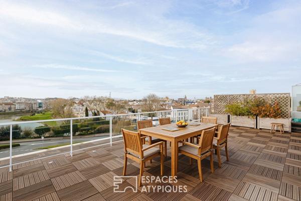 Penthouse lumineux à la vue panoramique et son garage XXL