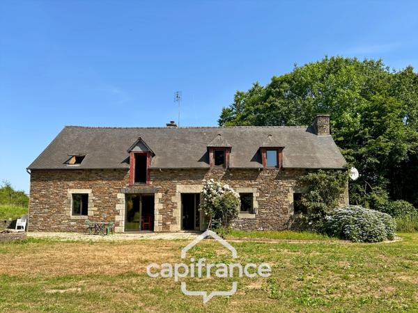 PROPRIÉTÉ DE CARACTÈRE SUR PLUS DE 9 HECTARES – MAISON EN PIERRE DE 235 M², APPARTEMENT INDÉPENDANT, DÉPENDANCE EN PIERRE, PRAIRIES, BOIS ET TROIS ÉTANGS – PROCHE LOUDÉAC