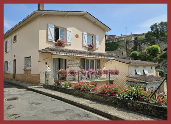 Propriété 3 logements avec terrain et garages