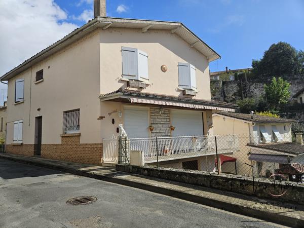Propriété 3 logements avec terrain et garages